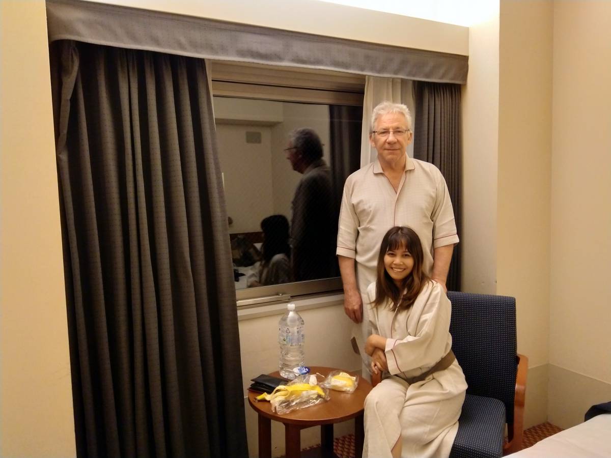 Dressed in the hotel bath robe Dressed in the hotel bath robe