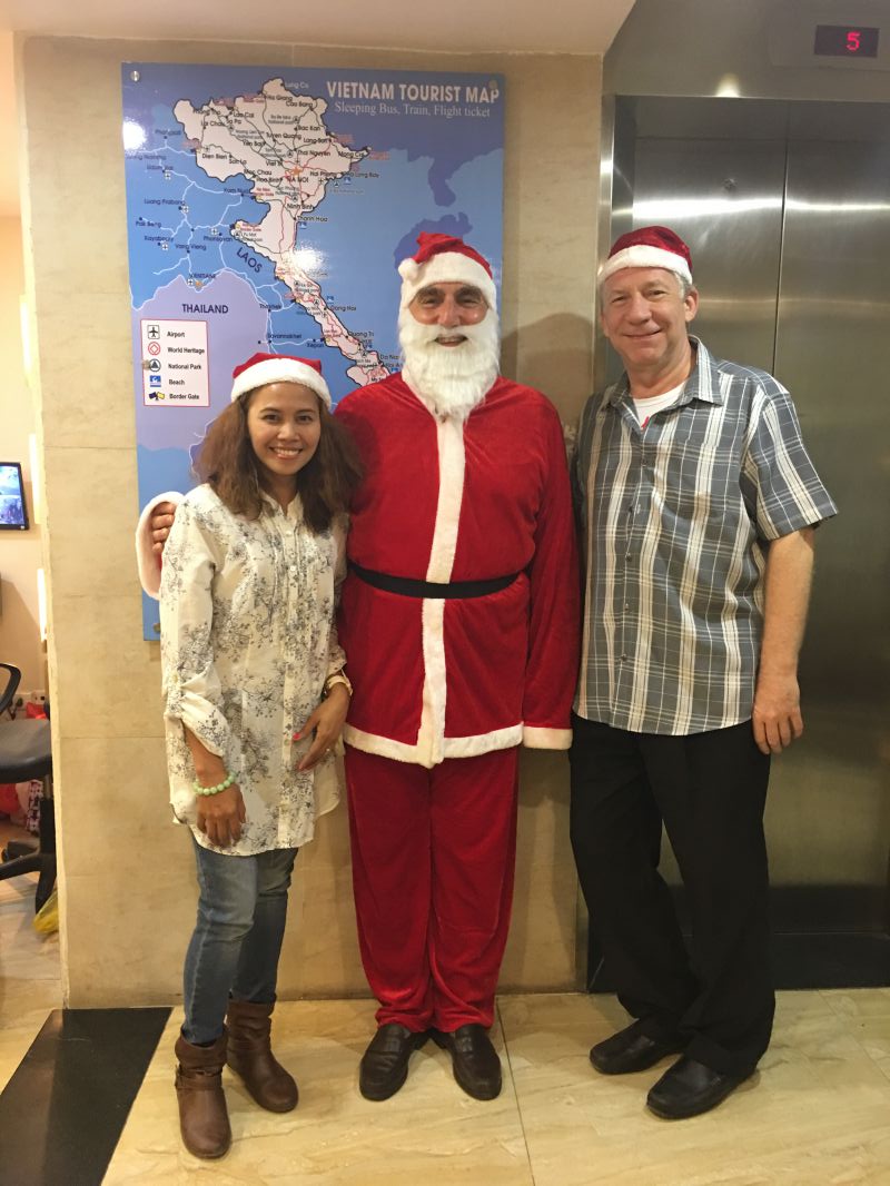 Santa up for a photo Christmas party in hotel